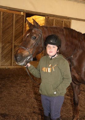 Chrislar student with horse