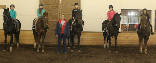 Chrislar students in a group riding lesson with riding instructor Deb Nichols