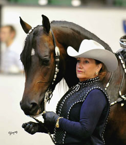 Chris Cassenti at a horse show with a trained western horse
